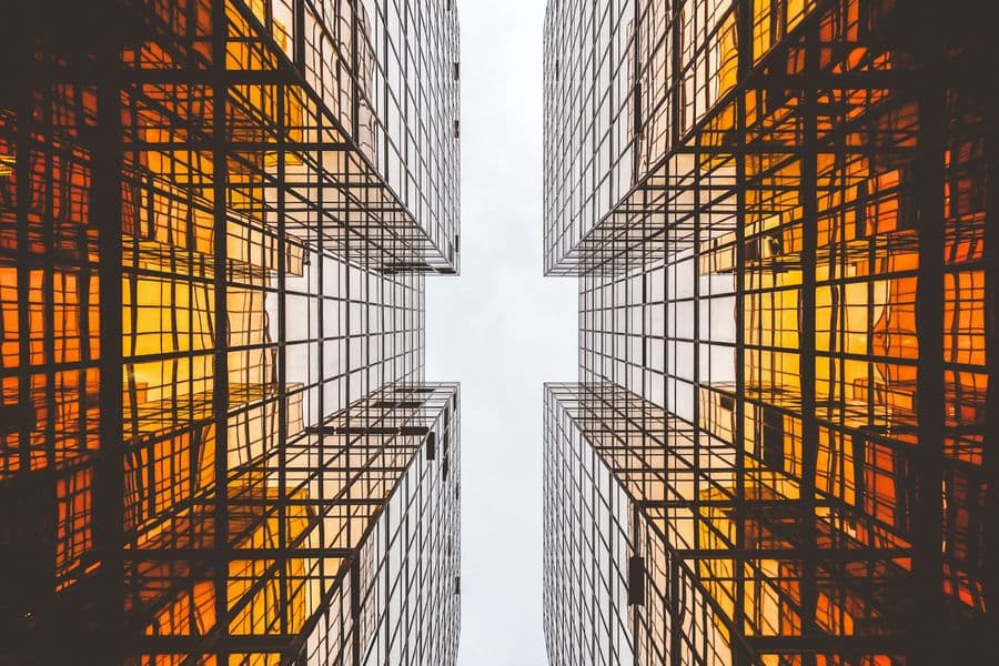 Amber-tinted glass facade grid catching the light