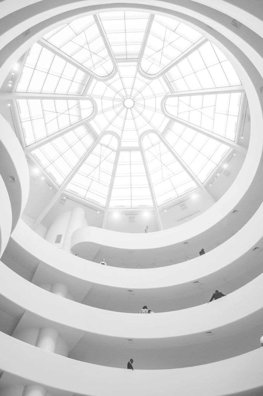 White domed skylight flooding an atrium with daylight